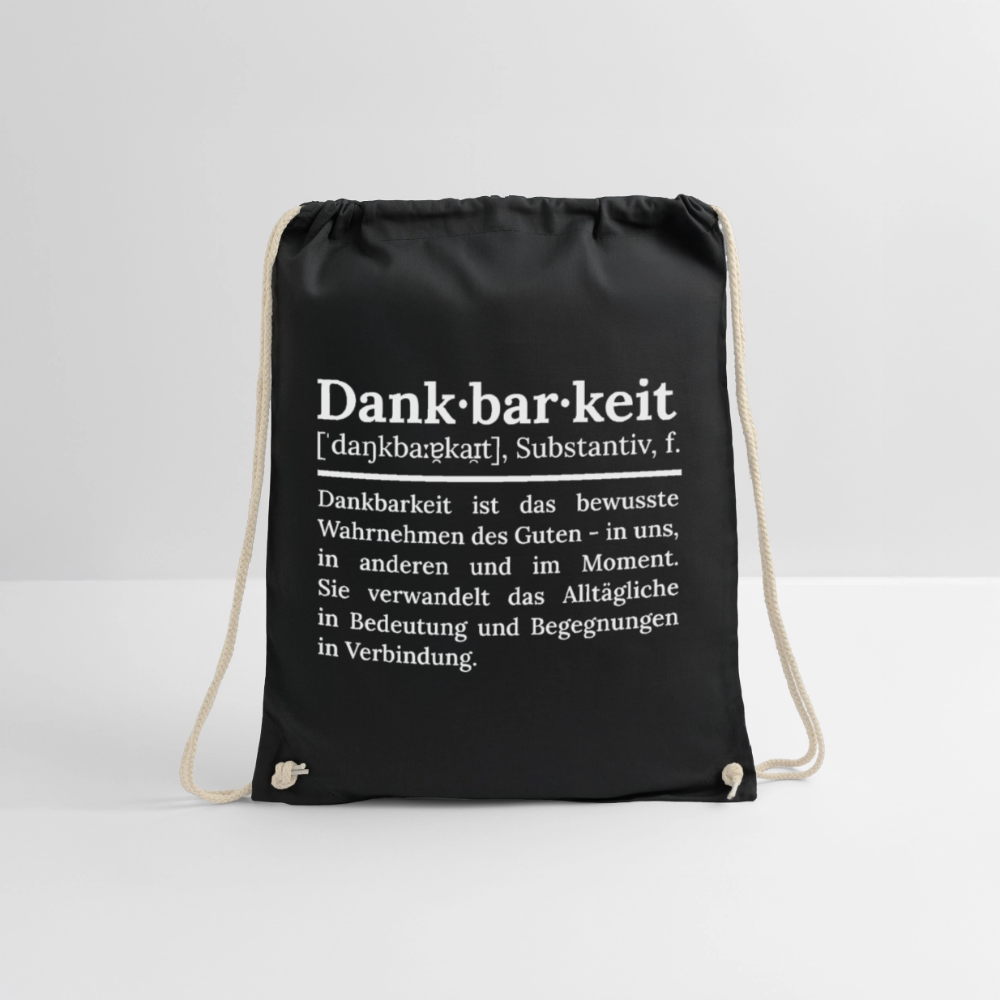 Design-Turnbeutel „Dankbarkeit“ in schwarz aus Bio-Baumwolle. Aufgestellter nachhaltiger Stoffbeutel als treuer Alltagsbegleiter.